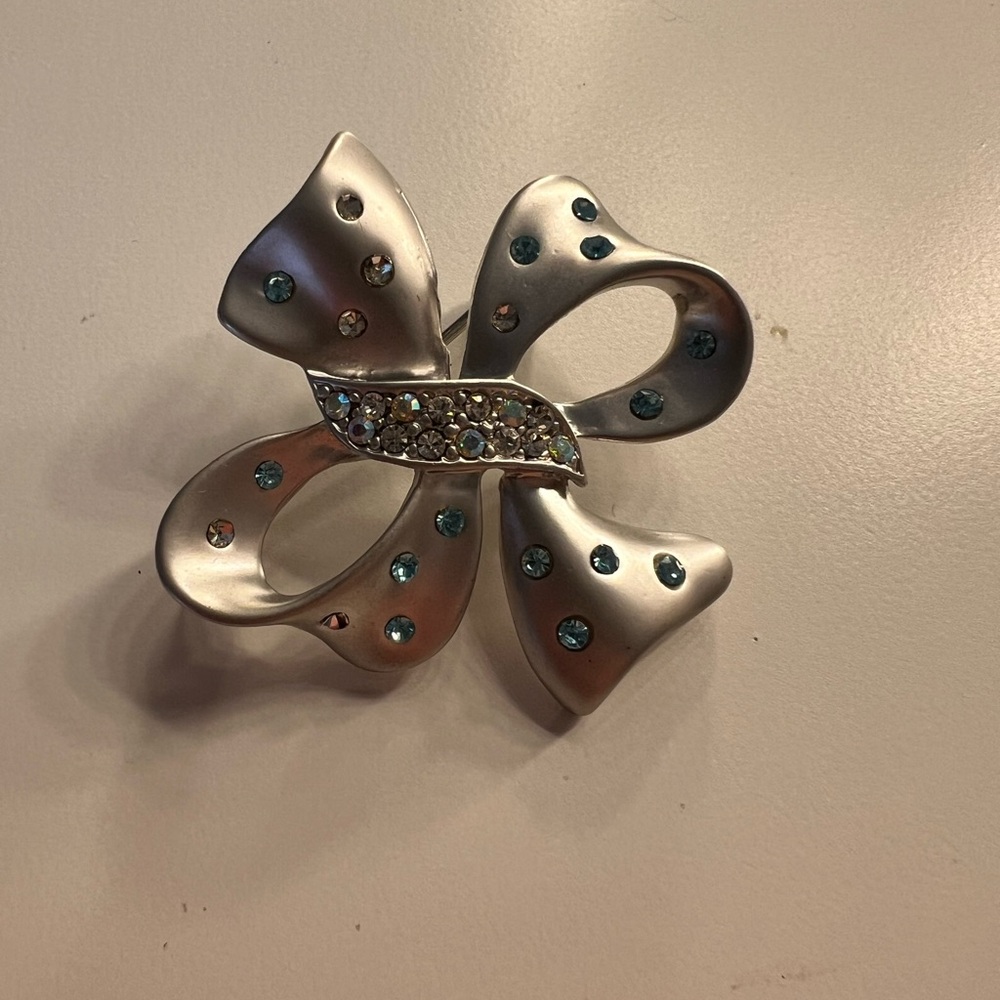 Elegant Silver and Blue Bow Brooch